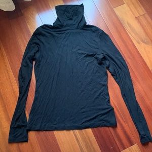Black turtleneck sweater.